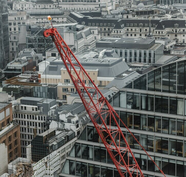 Red Crane with Building under construction in the background